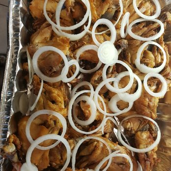 Alabon Libon - a tray of chicken with onions - Haitian Near Me - Toronto, Ontario