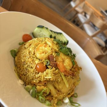 Manon - Pineapple Fried Rice (chicken, shrimp, Chinese sausage) - Thai Near Me - Fullerton, California Manon - Pineapple Fried Rice (chicken, shrimp, Chinese sausage) - Thai Near Me - Fullerton, California