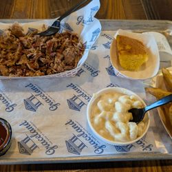 Chopped BBQ pork, Mac and cheese, potato wedges, cornbread