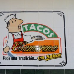 Tacos Camarena - identifica su logo sobre torres landa