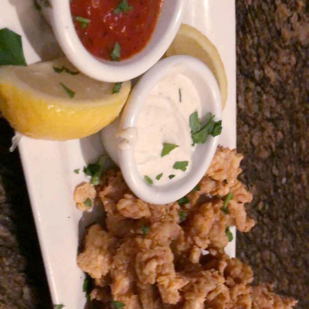 BJ's Restaurant & Brewhouse - Calamari served warm not hot. - New American Near Me - Allen, Texas BJ's Restaurant & Brewhouse - Calamari served warm not hot. - New American Near Me - Allen, Texas