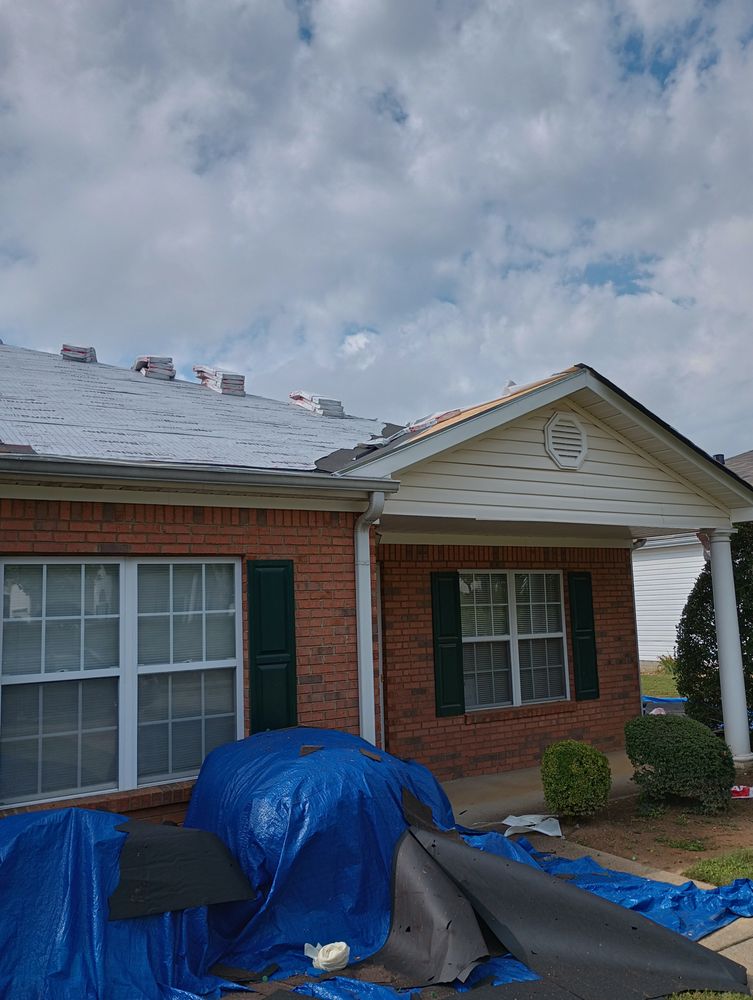 Slide of T & R Roofing