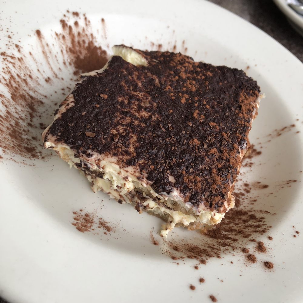 Tomatina - TIRAMISU - $9.75 - Ladyfingers, espresso, mascarpone, and sweet Marsala. - Italian Near Me - Alameda, California Tomatina - TIRAMISU - $9.75 - Ladyfingers, espresso, mascarpone, and sweet Marsala. - Italian Near Me - Alameda, California