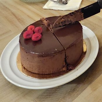 Patisserie Bechler - Marquise cake. Sorry... the pretty flowers and white chocolate piece with the inscription were taken off at this point. - Bakeries Near Me - Pacific Grove, California