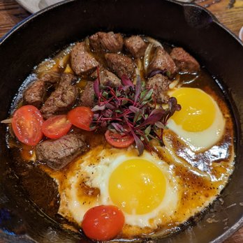 HEM Kitchen And Bar - Steak and eggs. Incredible complex flavor. We soaked it up with provided baguette - Vietnamese Near Me - Houston, Texas HEM Kitchen And Bar - Steak and eggs. Incredible complex flavor. We soaked it up with provided baguette - Vietnamese Near Me - Houston, Texas