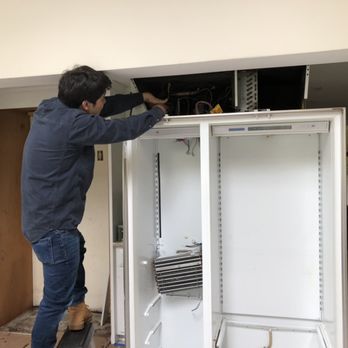 Joseph Cote - Jonathan disassembling the freezer. - Appliances & Repair Near Me Joseph Cote - Jonathan disassembling the freezer. - Appliances & Repair Near Me
