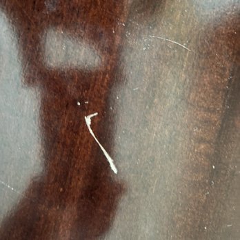 Most Valuable Moving - Top of dresser, clearly not wrapped. - Movers Near Me