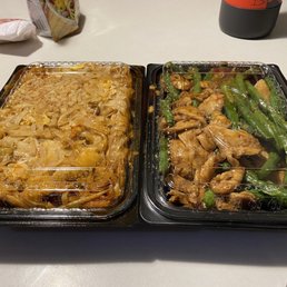 Chicken Pad Thai on the left, and Chicken with green beams on the right. Chicken Pad Thai on the left, and Chicken with green beams on the right.