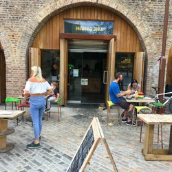 Deptford Market Yard - Mama's Jerk Caribbean streetfood. Just one of the over 15 independent small cafes, restaurants, shops and businesses at Deptford Market Yard