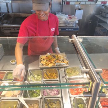 Willy's Mexicana Grill - Clarice making a killer nachos - Mexican Near Me - Athens, Georgia Willy's Mexicana Grill - Clarice making a killer nachos - Mexican Near Me - Athens, Georgia