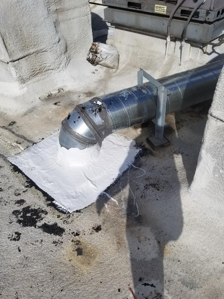 Slide of Huncho Roofer