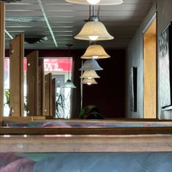 Olympia Family Restaurant - Long row of bothers along the north east wall of windows.