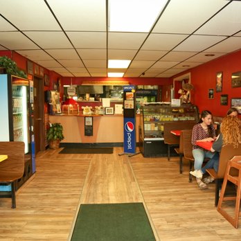 Village Pizzeria - the interior of the restaurant - Pizza Near Me - Middleport, New York Village Pizzeria - the interior of the restaurant - Pizza Near Me - Middleport, New York