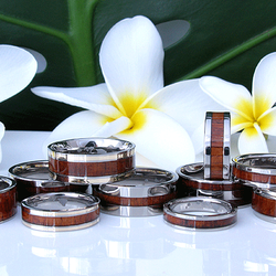 Jewel of Paradise - Hawaiian Koa wood rings are available in six standard styles, priced at $199 plus three premium styles with cz or yellow gold.