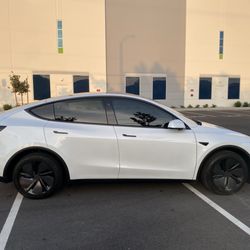 Sun Busters - Medium ceramic tint on my new Tesla model y with