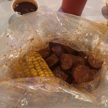 The Boiling Crab - Corn and sausage link in whole shabang mild - Seafood Near Me - San Marcos, California The Boiling Crab - Corn and sausage link in whole shabang mild - Seafood Near Me - San Marcos, California
