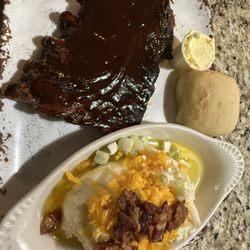 Owl Club & Restaurant - Half a rack of ribs and loaded mashed potatoes