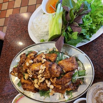 Thien Long - Cha ca la vong. Turmeric catfish on a bed of dill and onions - Vietnamese Near Me - San Jose, California