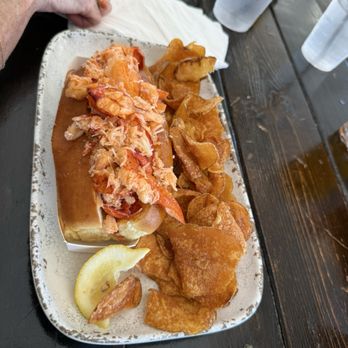 Lookout Tavern - Huge hot lobster roll with homemade chips - Seafood Near Me - Oak Bluffs, Massachusetts Lookout Tavern - Huge hot lobster roll with homemade chips - Seafood Near Me - Oak Bluffs, Massachusetts