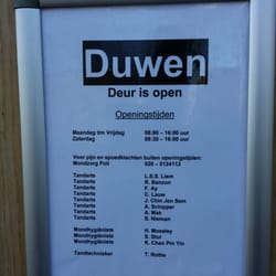 Tandarts Liem - Informatiebord op de deur