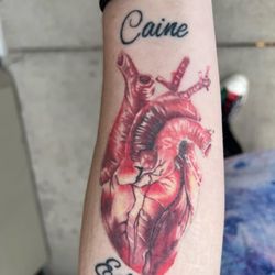 Rushmore Tattoo - Realistic heart with children's names