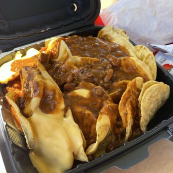 Nessy Burgers - Chili cheese nachos. Typical big can cheese and chili nachos like at football games or the movies. - Burgers Near Me - Fallbrook, California Nessy Burgers - Chili cheese nachos. Typical big can cheese and chili nachos like at football games or the movies. - Burgers Near Me - Fallbrook, California