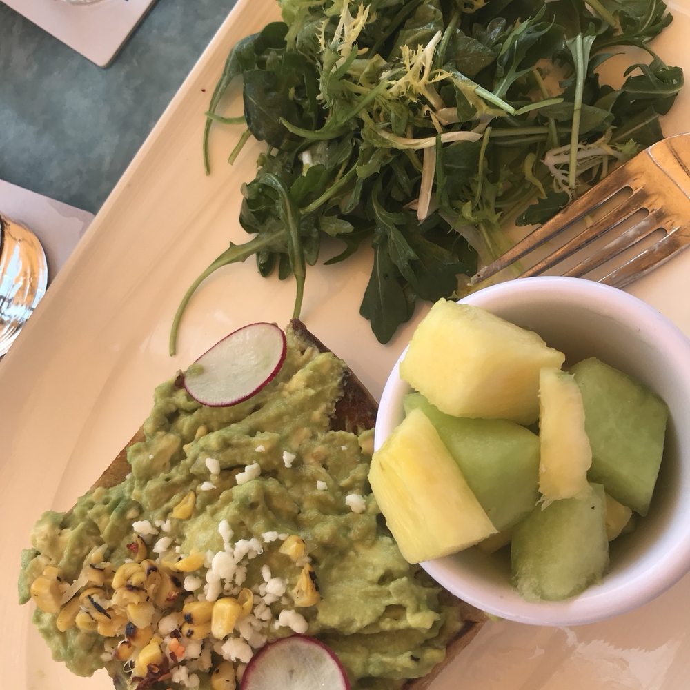 Deck 84 - Avocado toast on ciabatta (too thick and chewy) IG: LunchwithLaur - New American Near Me - Delray Beach, Florida