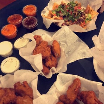Snacks At The Bellagio - Chicken wings and pork belly nachos - Cafes Near Me - Las Vegas, Nevada