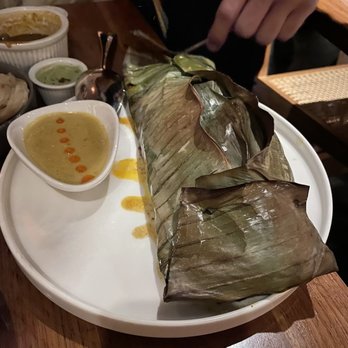 Semma - outside of banana leaf wrapped sea bass - Indian Near Me - New York, New York Semma - outside of banana leaf wrapped sea bass - Indian Near Me - New York, New York