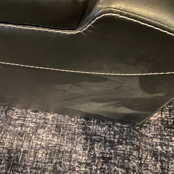 Ashley Store - More messed up leather on the sides of the sofa. - Furniture Stores Near Me - Alpharetta, Georgia