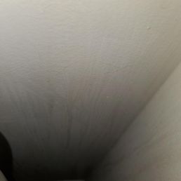 Unpainted wall areas