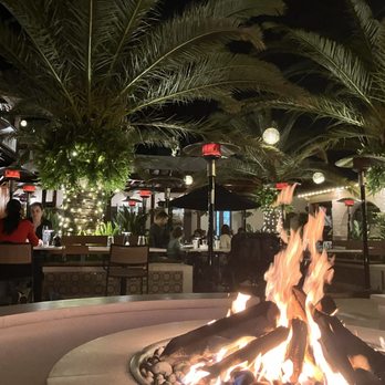 Saint - Beautiful fire pit overlooking the patio magical night - Italian Near Me - St. Augustine, Florida Saint - Beautiful fire pit overlooking the patio magical night - Italian Near Me - St. Augustine, Florida