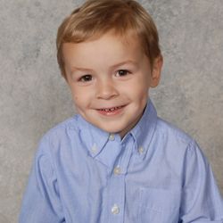 Mark Lawrence Photographers - Preschooler photographed at their school for their yearbook.