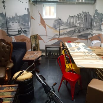 Café Scrapyard - Cool back room and graffiti art by the same artist that decorated these walls on display and for sale - Cocktail Bars Near Me - Amsterdam, New Hampshire
