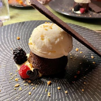 Makahiki - Warm chocolate toffee brownie with vanilla ice cream - Bars Near Me - Kapolei, Hawaii