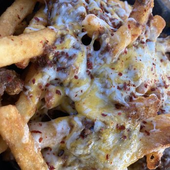 Revelry Kitchen + Bar - Chili Cheese Fries (without green onion) - American Near Me - Austin, Texas Revelry Kitchen + Bar - Chili Cheese Fries (without green onion) - American Near Me - Austin, Texas