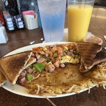 Lonesome Spur Cafe - Build your own veggie omelette with ham. No cheese extra crispy on the hashbrowns and the toast. - Breakfast & Brunch Near Me - Justin, Texas Lonesome Spur Cafe - Build your own veggie omelette with ham. No cheese extra crispy on the hashbrowns and the toast. - Breakfast & Brunch Near Me - Justin, Texas