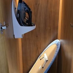 Circ Hotel - Iron and ironing board in the closet