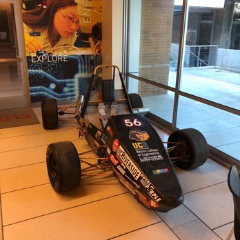 Bytes - a race car in the lobby of a building - Coffee & Tea Near Me - Riverside, California