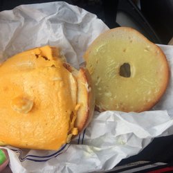 McDonald's - Weird sauce on bagel - maybe weird color butter- smells like honey mustard- who the f' puts it in a bagel egg and cheese