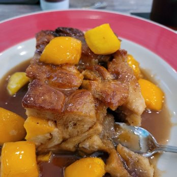 Cutlass Grille - Mango coconut bread pudding - Caribbean Near Me - Chesapeake, Virginia Cutlass Grille - Mango coconut bread pudding - Caribbean Near Me - Chesapeake, Virginia