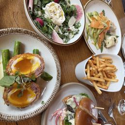 Scotch egg, burger, fries, halibut, burrata Scotch egg, burger, fries, halibut, burrata
