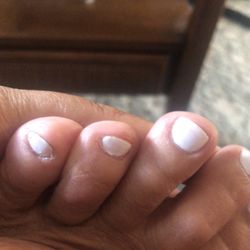 Town Nails - You can see where polish is on cuticle and this is after she said she fixed it.