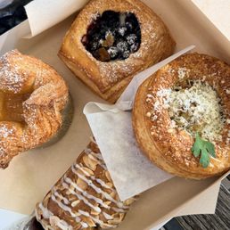 Passion fruit kougin amaan, blueberry custard, artichke, bear claw Passion fruit kougin amaan, blueberry custard, artichke, bear claw