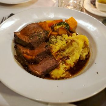 Grotto - Braised short rib with mashed potatoes and roasted veggies - Italian Near Me - Syracuse, New York Grotto - Braised short rib with mashed potatoes and roasted veggies - Italian Near Me - Syracuse, New York