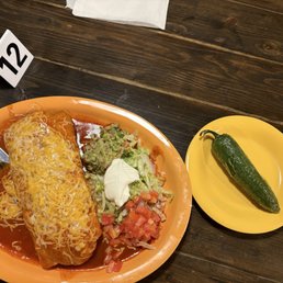 Smother burrito with a grilled jalepeno!!! Straight fire Smother burrito with a grilled jalepeno!!! Straight fire