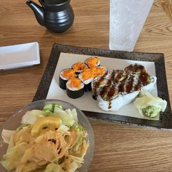 Salmon roll with caviar (optional) on top and shrimp tempura served with fresh sliced ginger, wasabi, soy sauce & a house salad.
