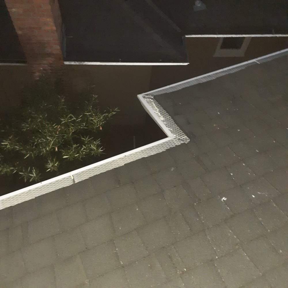 Slide of JB Rain Gutter installation