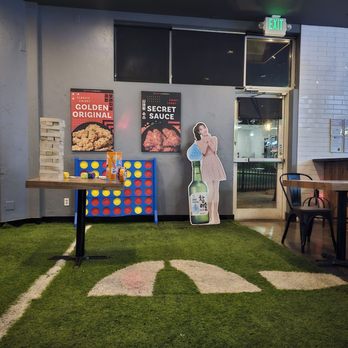 bb.q Chicken Lone Tree - Inside turf game area - Chicken Wings Near Me - Lone Tree, Colorado bb.q Chicken Lone Tree - Inside turf game area - Chicken Wings Near Me - Lone Tree, Colorado