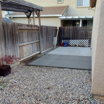 Brick House Masonry and Concrete Designs - Backyard 11' x 10' concrete slab, properly tied-in with rebar to existing slab - Masonry/Concrete Near Me - Turlock, California Brick House Masonry and Concrete Designs - Backyard 11' x 10' concrete slab, properly tied-in with rebar to existing slab - Masonry/Concrete Near Me - Turlock, California